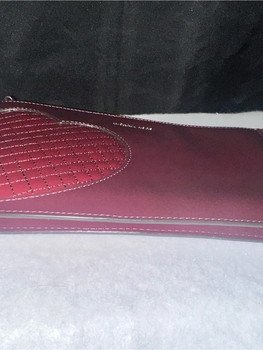 Michael Kors wristlet logo
